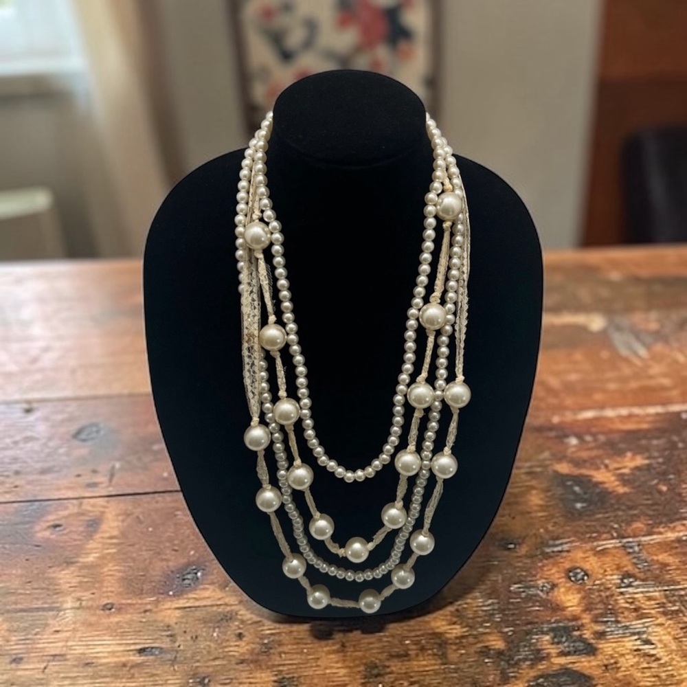 Vintage creamy faux pearls & lace combined to make a beautiful romantic necklace